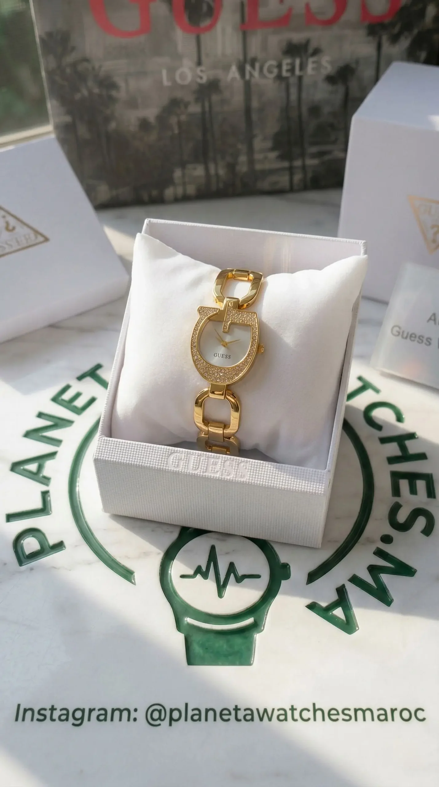 Montre Femme Guess GW0683L2 : L'Éclat Doré du Boîtier en "G" - الصورة 2